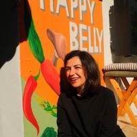 The owner, Tixhi!  at Happy Belly / Eat Smart in Tirana