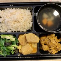 Bento sesame rice with vegetables,rendang,curry potatoes .  In general nice food . at Greendot 绿一点 - Nex in Northeast Singapore