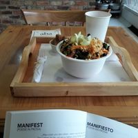 big paella with plantein and juice at Aba Opción Vegetariana in Bogota