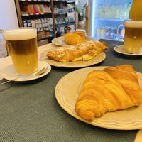 Latte & stuffed croissants 🥐   at Green Beans in Lisbon