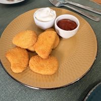 My little guy didn’t care for these nuggets.   at Green Beans in Lisbon