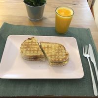 Salami + Cheese toast with a fresh Orang Juice at Green Beans in Lisbon