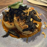 Sourdough crumpets with bush tomato curry  at Two Chaps in Marrickville