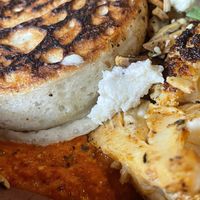 Crumpet with capsicum cream vegan feta and almonds    at Two Chaps in Marrickville