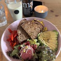 Breakfast bowl and matcha latte  at Emmi's Kitchen - Glockenbach in Munich