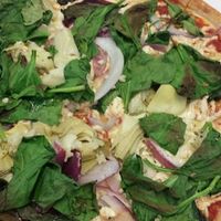 vegan pizza, daiya cheese, artichokes, basil, onion, roasted garlic, red sauce, etc at Blaze Pizza in Oklahoma City