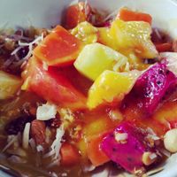 muesli fruit bowl with mango juice at Bali Maitreya Cafe in Lembongan