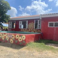 Exterior of dining area and kitchen  at Hofi Cas Cora in Willemstad