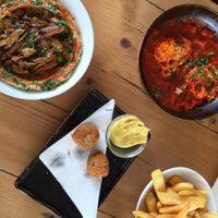 hummus with vegan shumbara, vegan bitterballen (we couldn't wait) plus the roasted pepper egg dish   at Traffic in Amsterdam