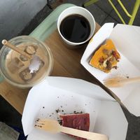 Oat Milk Latte, Coffee, Mango Cashew Cake, Strawberry Coconut Cake  at LAS in Sopot