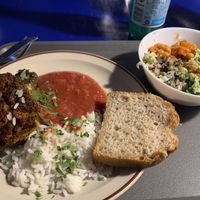 Stuffed pepper main entree with side salads   at Madglad Cafeteria in Copenhagen