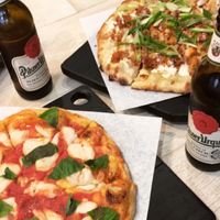 margarita (bottom left) and stranger wings (top right) at Virtuous Pie  in Vancouver