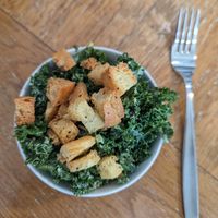 Kale Caesar side salad at Virtuous Pie  in Vancouver