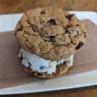 Virtuous Pie is 100 percent vegan with pizza and handcrafted ice cream sandwiches! Scoop of delicious vegan ice cream between two perfect chocolate chip cookies. at Virtuous Pie  in Vancouver