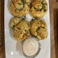 Garlic knots. Just the right amount of kick. Not too hot with the pepper flakes    at Virtuous Pie  in Vancouver