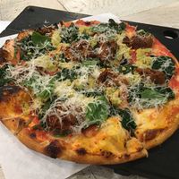 Meatballs and chèvre pizza  at Virtuous Pie  in Vancouver