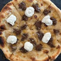 Bianca plus extra sausage at Virtuous Pie  in Vancouver