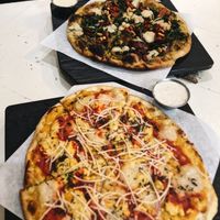Top: Ultraviolet, Bottom: Grandma Pie (the besssttt IMO) with side of Blue cheese sauce and Garlic ranch at Virtuous Pie  in Vancouver