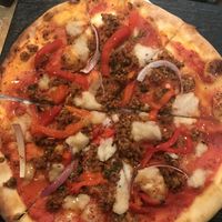 Sweet pepper and sausage pizza  at Virtuous Pie  in Vancouver