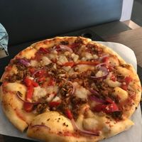 Sweet pepper and sausage pizza at Virtuous Pie  in Vancouver