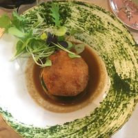 Inlander (filled with pineapple and something that tastes like salmon, on top of some kind of potato pancake) spinach and salad are more decor than actually part of the dish  at 26 Vegan Food Project in Lisbon