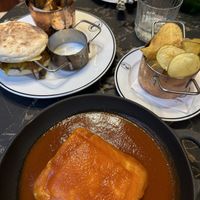 Bifana sublime (left), francesinha  at 26 Vegan Food Project in Lisbon