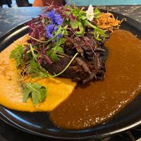 Mushroom dish (lots of them!) with sauces, salad with drizzle of raspberry dressing at 26 Vegan Food Project in Lisbon