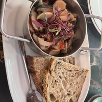Octopus salad with sourdough breadd  at 26 Vegan Food Project in Lisbon