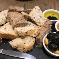 Stale bread and olives at 26 Vegan Food Project in Lisbon
