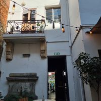 Outdoor hidden away seating area in the cafe. at Honest Chocolate Shop in Cape Town