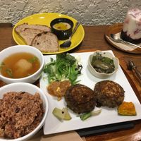 Lentil burger set, hummus and bread side with a black current and soy milk drink.  at Kissa Saeki in Hiroshima