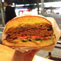 the half of double cheeseburger  at Rainbow - Ibn Gvirol in Tel Aviv