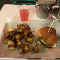 Schnitzel (soy with panko) burger, potato wedges and lemonade at Rainbow - Ibn Gvirol in Tel Aviv