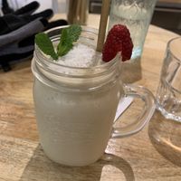 Mango smoothie with paper straw. Amazing. Not too sweet or sour.  #Veganuary at Sweet Rawmance in Paris