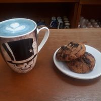 Blue spirulina latte and chocolate chip cookies!!! #Veganuary at Coz Coffee Roasting Co. in Cozumel