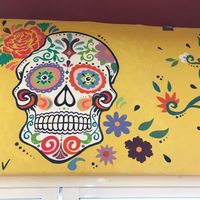 Awesome artwork on the walls by local artists, everything is locally sourced. at Coz Coffee Roasting Co. in Cozumel