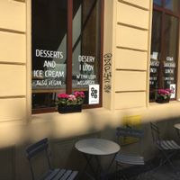 Windows with vegan signs  at Mo-Ja Cafe in Krakow