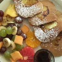Vegan pancakes and fresh fruit  at Mo-Ja Cafe in Krakow