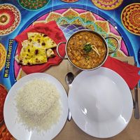 Garlic nan, chana masala (with chickpeas) and basmati rice, really good! at Red Chilli Indian Restaurant in Corfu