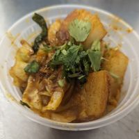 Aaloo Gobi , Cabbage with potatoes ,spinach ,onions and spices. Yummy!  at Curry Sultan in Humble