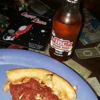 IBC cream soda, a slice of vegan deep dish pizza with artichoke, sun-dried tomatos, & roadted garlic. at Cappy's Pizzeria - Seminole Heights in Tampa