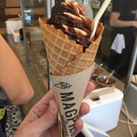 Vegan candy corn and chocolate swirl with vegan fudge at Magpies Softserve in Los Angeles