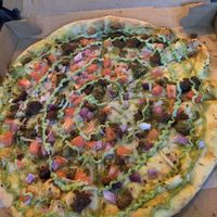 Falafel pizza. Comes with garlic aioli drizzle at Veggie Crust in Somerville