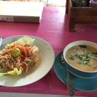 Papaya salad on left, Tom Yam soup on right  at Bodhi Tree Cafe in Chiang Mai