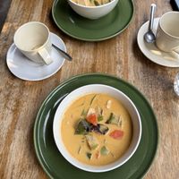 Our breakfast — two curries, two coffees  at Bodhi Tree Cafe in Chiang Mai