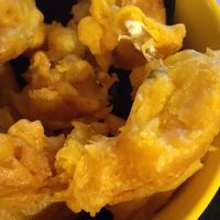 Clumps of flour and miscellaneous black bits in the onion rings at The Angel Microbrewery in Nottingham