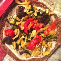 sunflower seeds crust with marinated/dehydrated veggies on a cashew cream at Natural Choice Cafe in Jerusalem