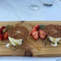 Dessert: pineapple ice cream with walnut cookie and rabarber compote  at Mediamatic ETEN in Amsterdam