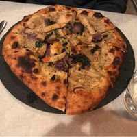 Pizza Nero: shiitake sauce, mushrooms, caramellized red onion and more. at Mediamatic ETEN in Amsterdam