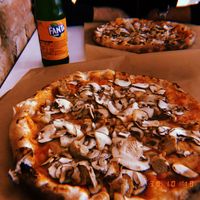 Mushroom and sausage pizza  at Pizzare in Berlin